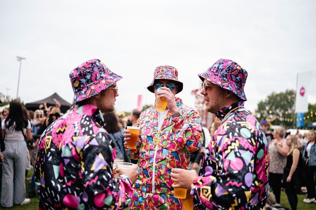 Matching suits and bucket hats: proper 90s dress code