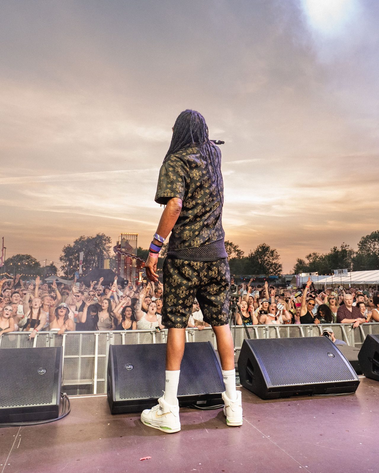 Facing the crowd at sunset
