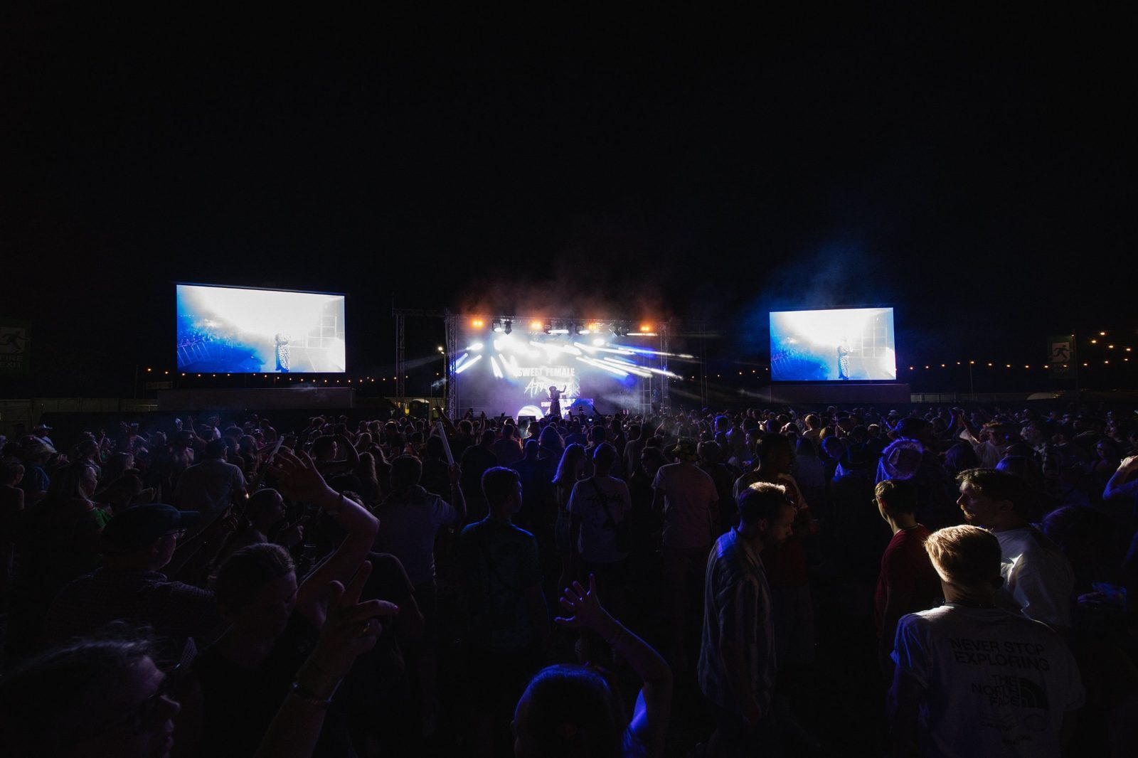 The crowd under the lights at night